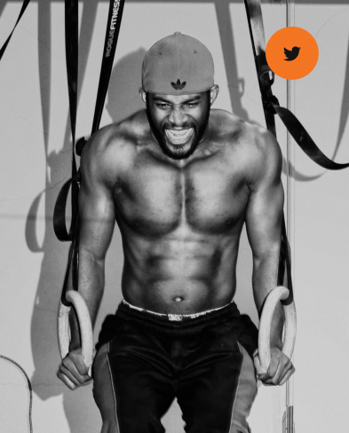 Man doing exercises on rings